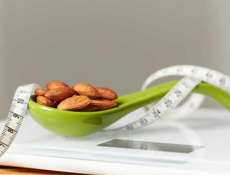 Replacing unhealthy foods with nuts could slow down the dreaded ‘middle-age spread’