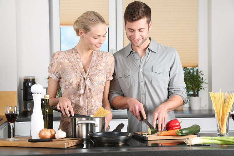 couple prepare food together