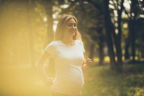 Pregnant woman running