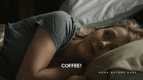 Woman in bed shouts coffee