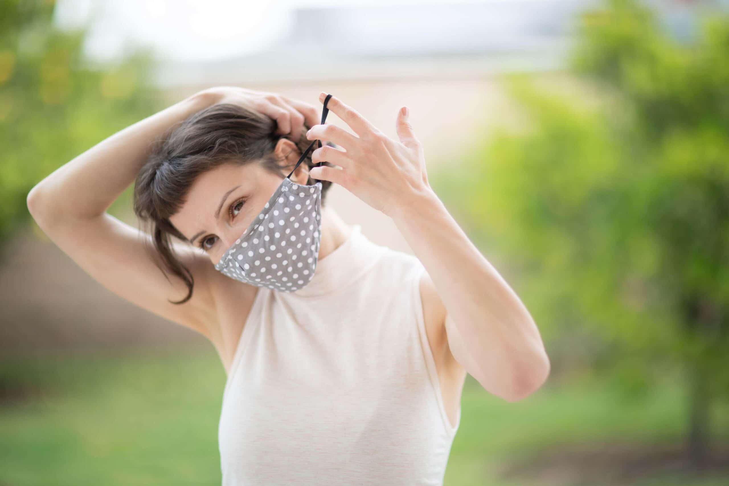 Woman wearing facemask scaled