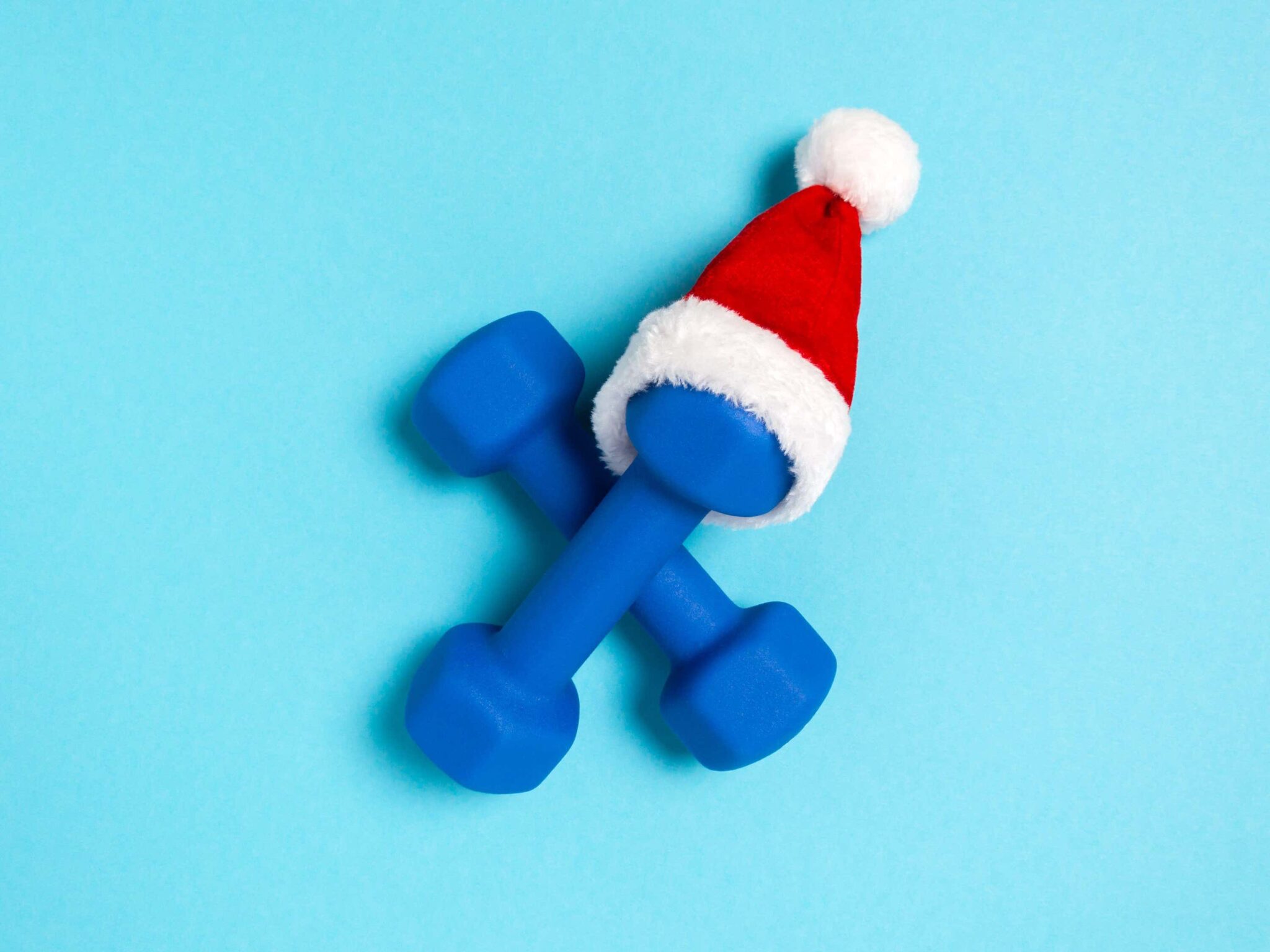 Dumbbells with christmas hat on