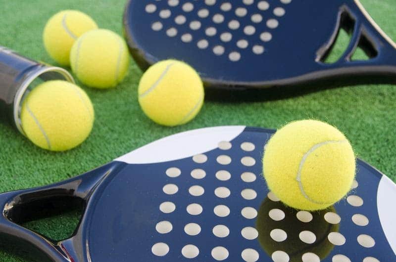 Padel tennis balls and rackets