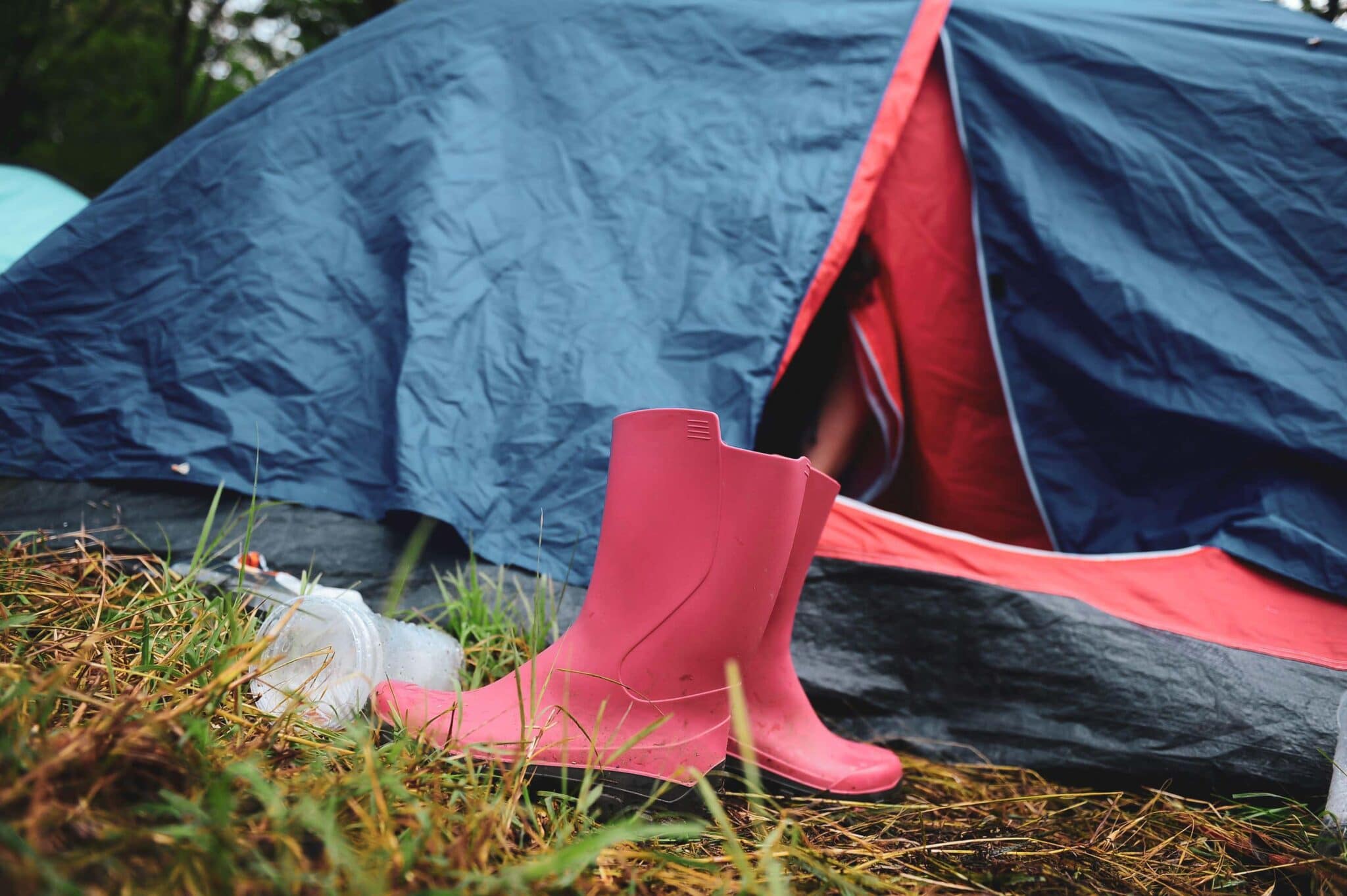 wellies outside a tent